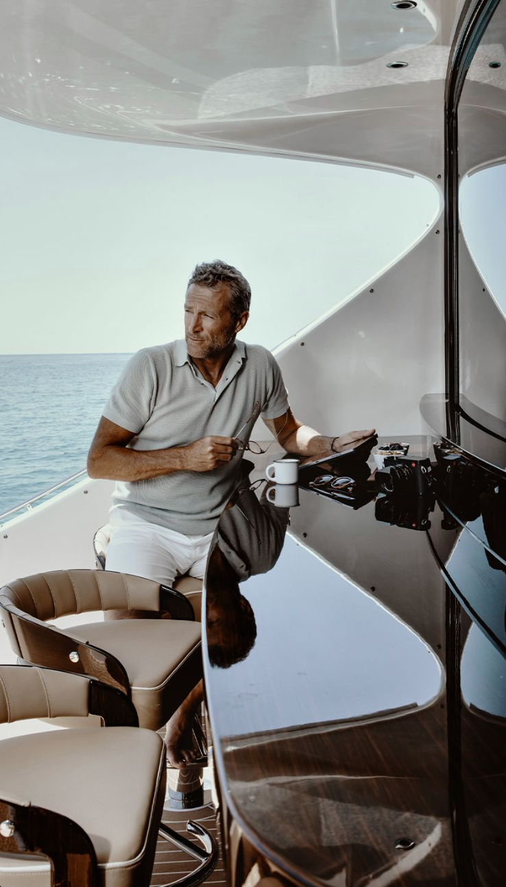 Yachtsman relaxing on luxury yacht